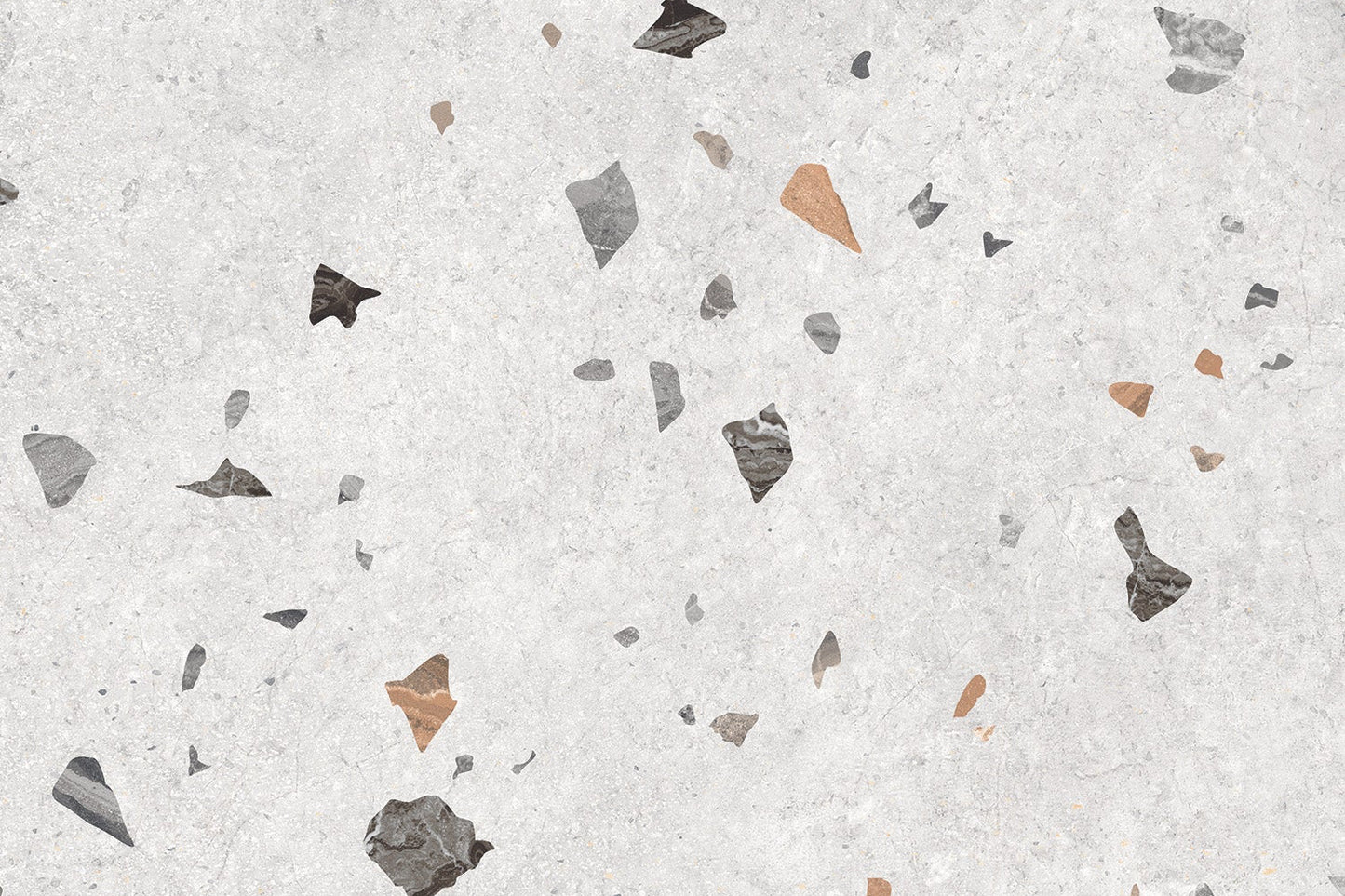 Patterned surface with scattered stone chips on a light gray background